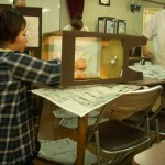 かがんで貼ってるから腰が〜